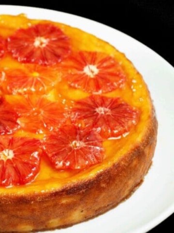 Ricotta cheesecake topped with blood oranges