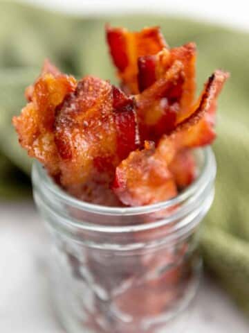 candied bacon in a glass jar