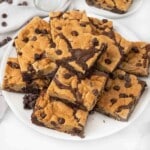 Brookies stacked on a white platter.