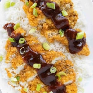 Katsu Chicken served over white rice with tonkatsu sauce.