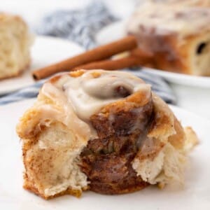 easy cinnamon roll on a white plate.