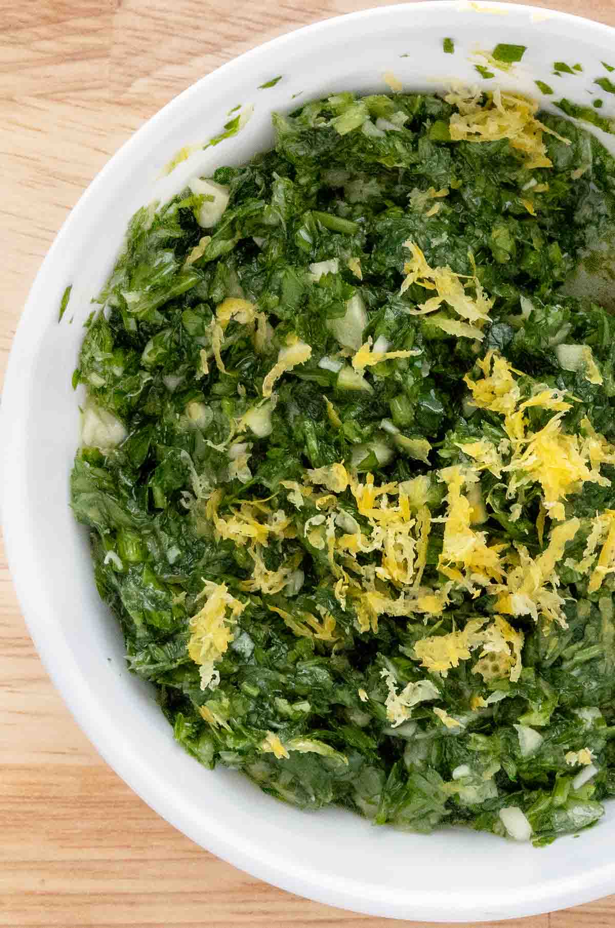 Gremolata in a white bowl