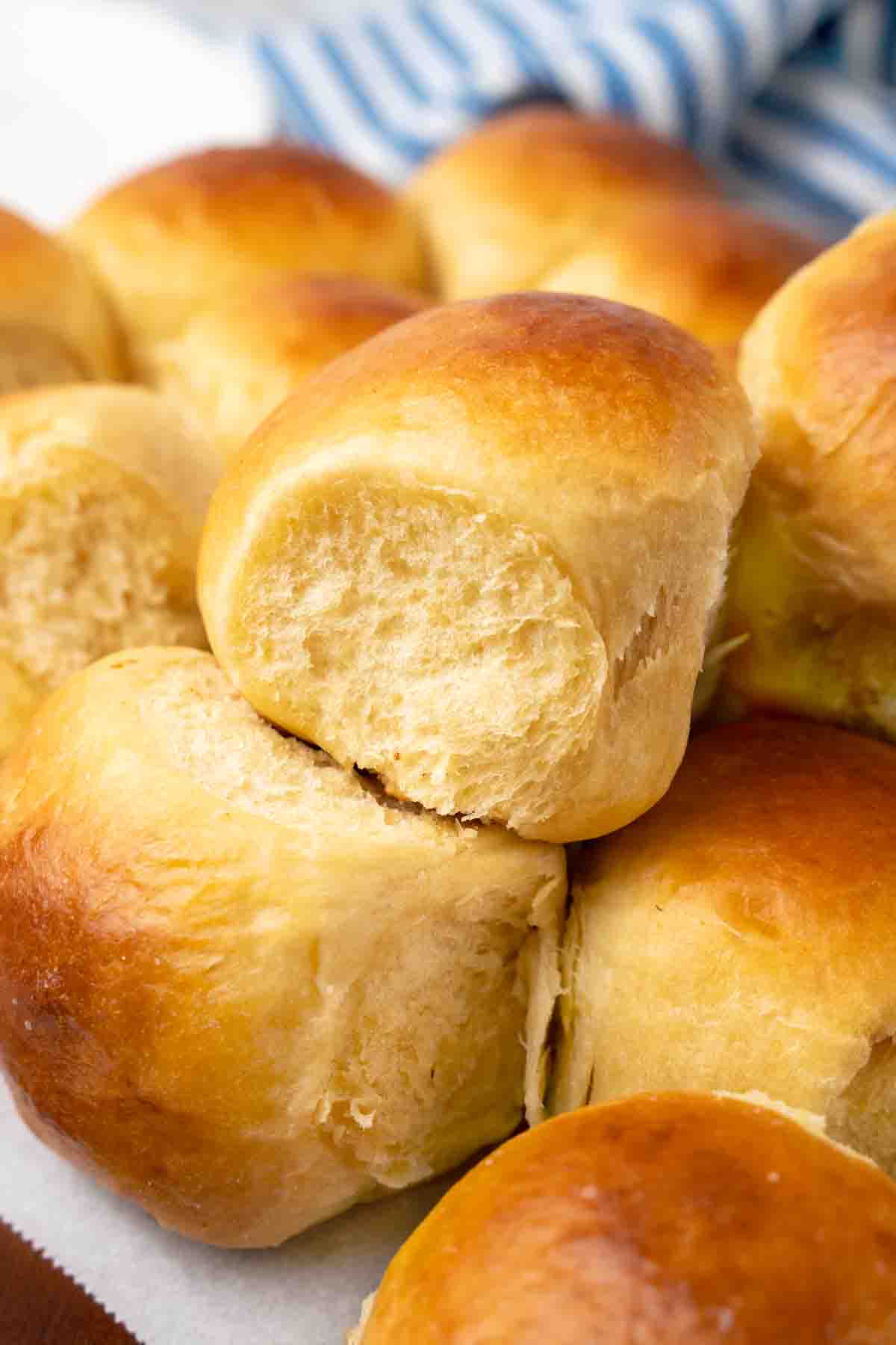 Hawaiian dinner rolls on parchment paper.