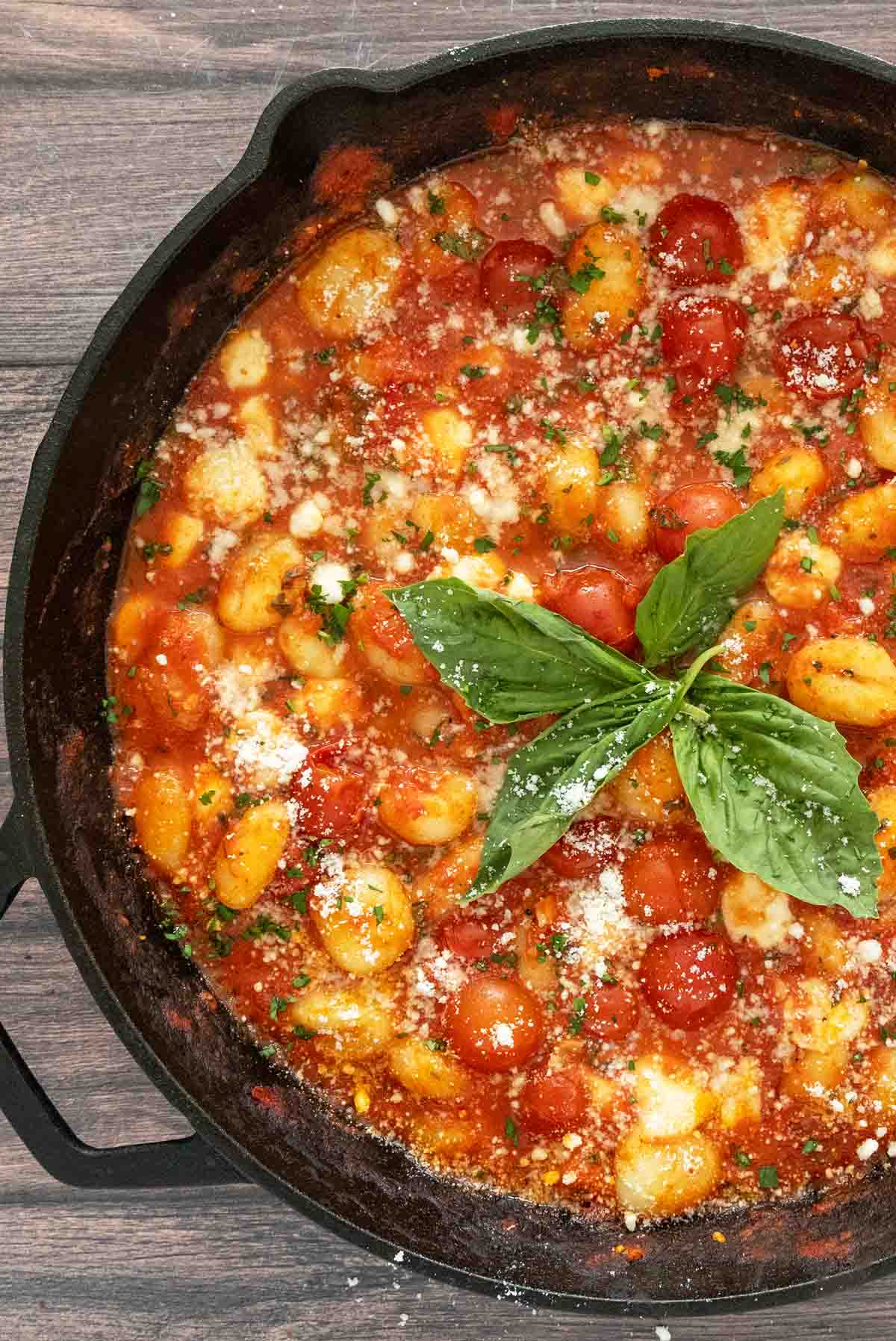 Gnocchi alla sorrentina in a cast iron pan.