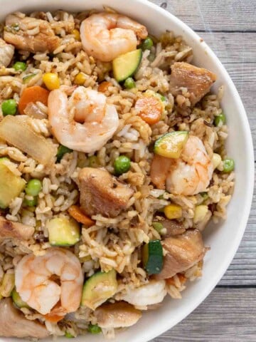 Shrimp and Chicken Fried Rice in a white bowl.