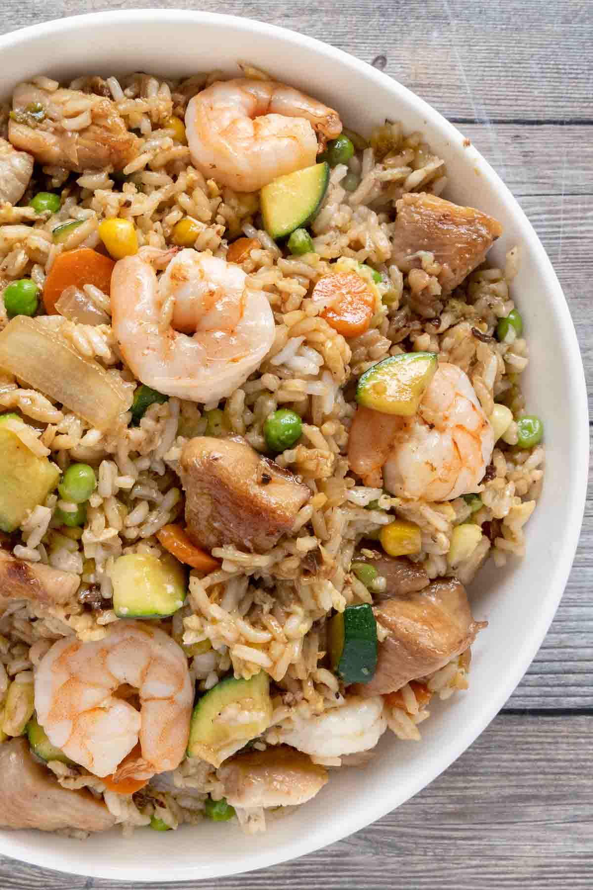 Shrimp and Chicken Fried Rice in a white bowl.