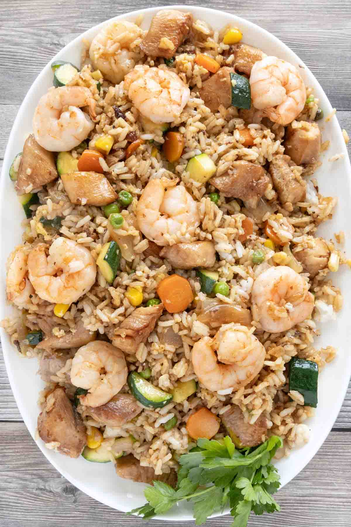 Shrimp and Chicken Fried Rice on a white platter.